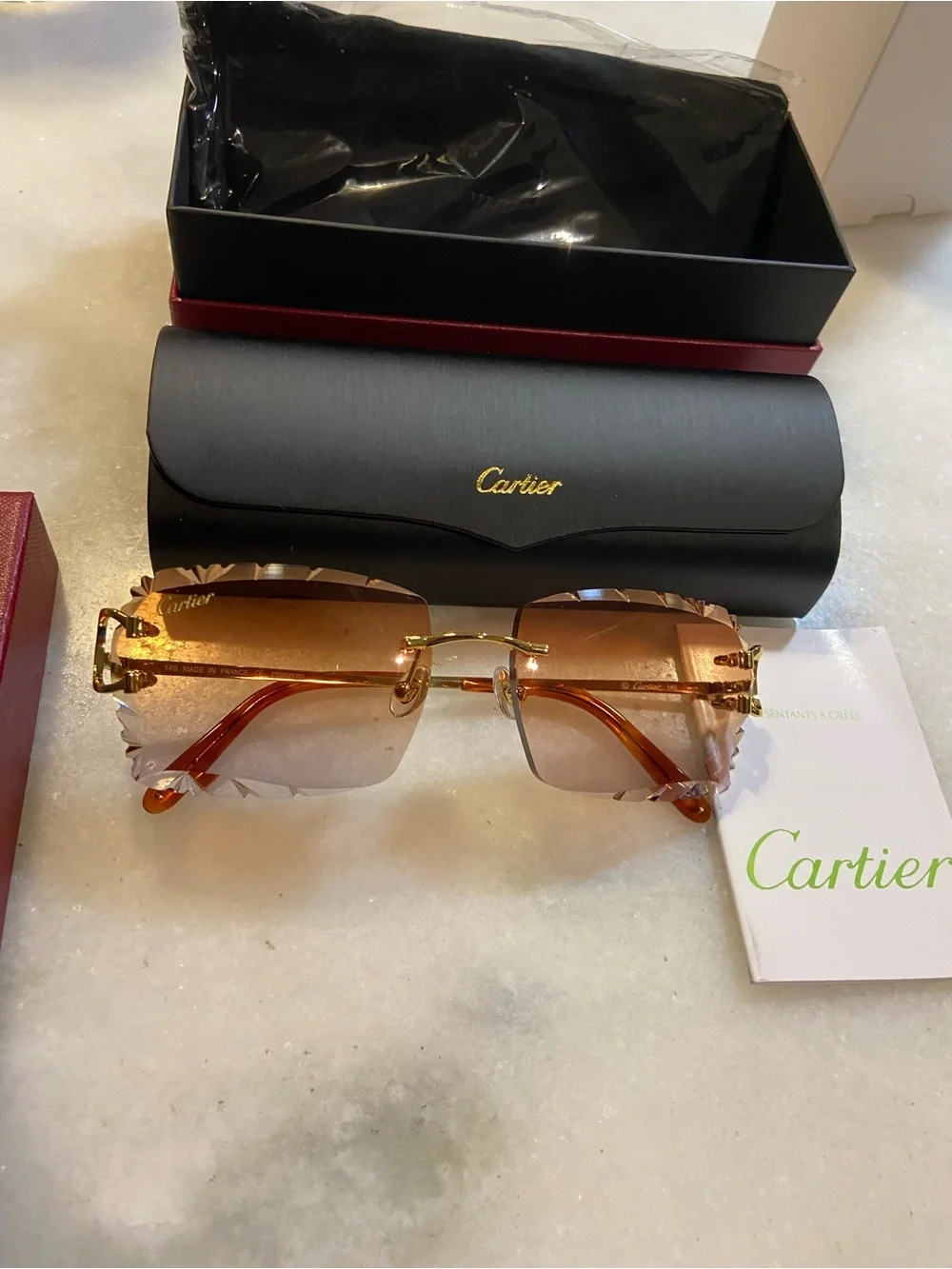 Cartier Rimless Sunglasses in Gold with Amber/Brown Lenses